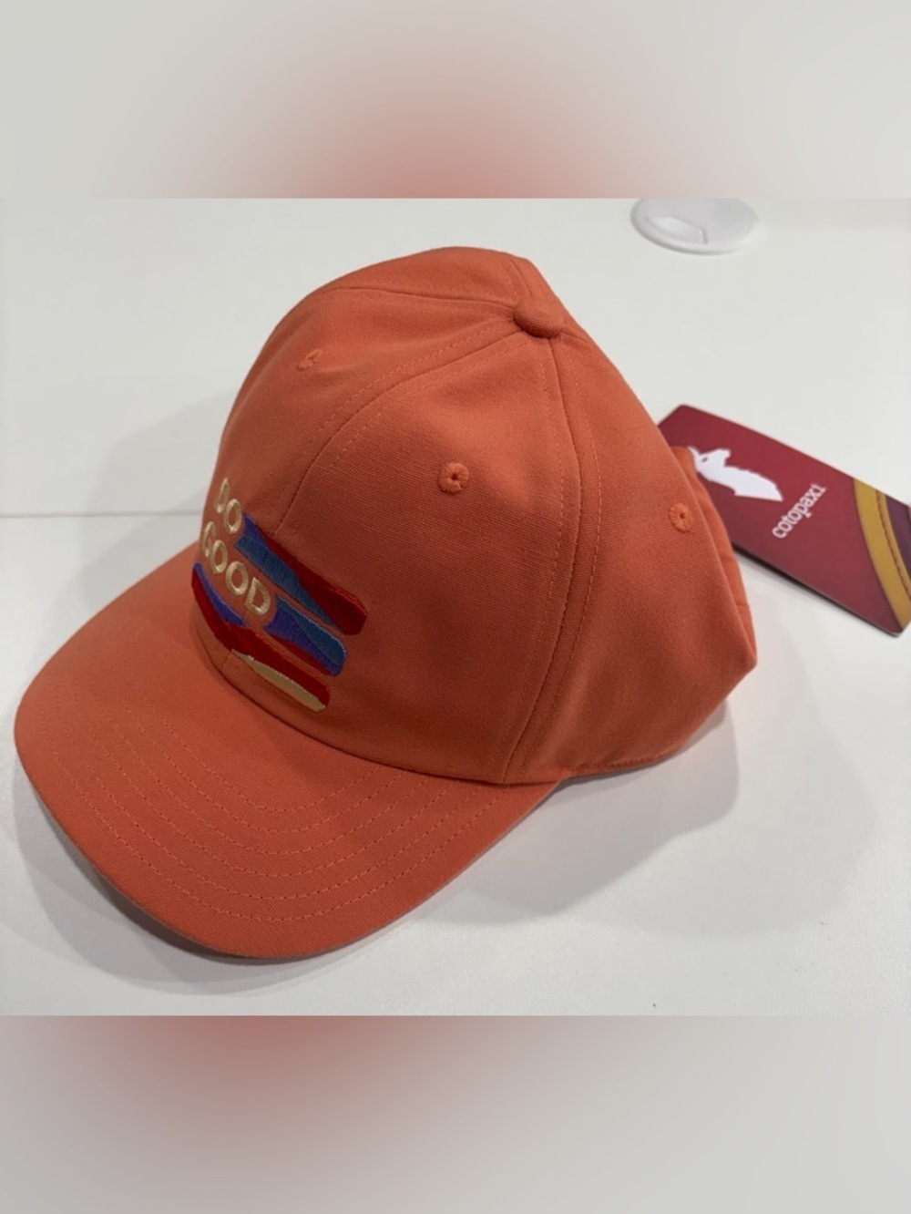 Cotopaxi Do Good Stripe Dad Hat NWT Embroidered Graphic Coral Adjustable Strap